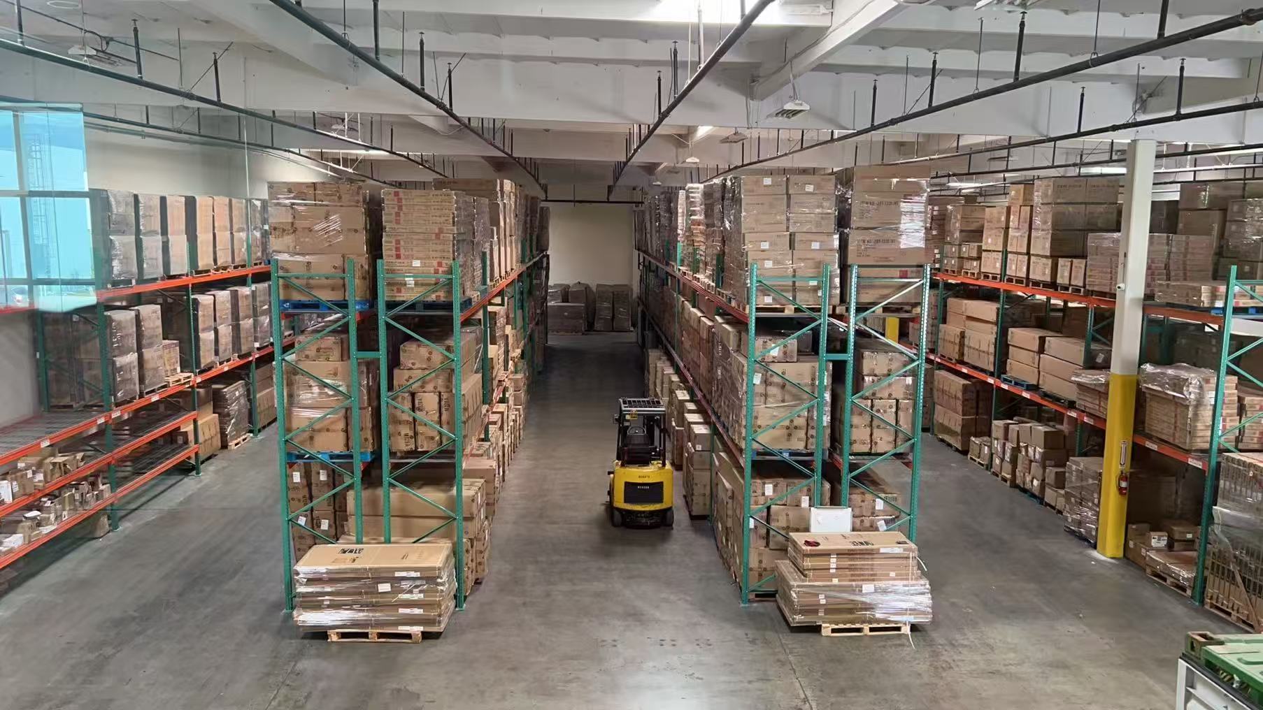 Kahaya warehouse racks with organized cartons and pallet storage